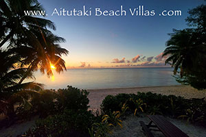 sunset over aitutaki lagoon in the cook islands