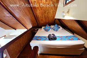 King size bed and towels in mezzanine